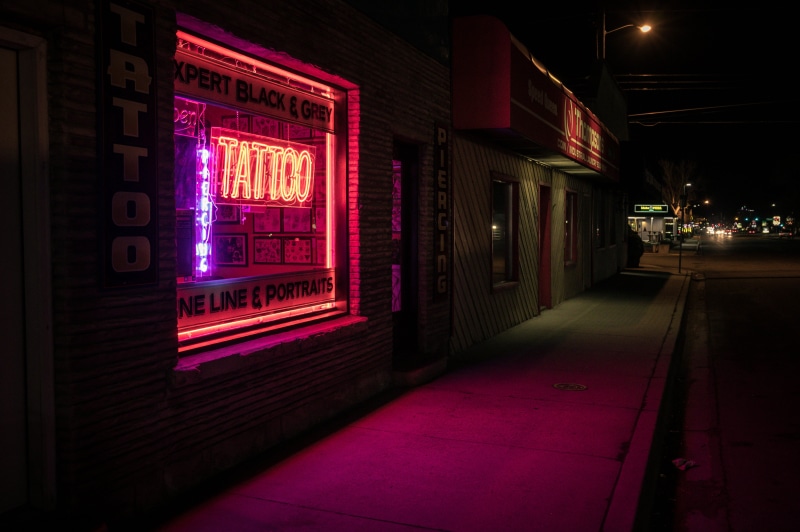 red, store, commerce, lighting equipment, urban, dark, lights, outdoors, sign, building exterior, architecture, 5K, no people, entrance, close-up, the way forward