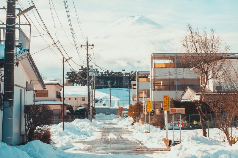 kawaguchiko, mountain, architecture, bare tree, building, skiing, village, cold temperature, street, building exterior, japan, explore, outdoors, snowing