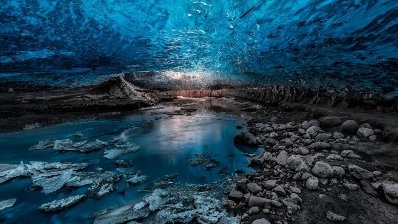 beauty in nature, rock - object, glacier, ice cave, cold temperature, blue, lake, power in nature, solid, frozen, reflection, sea cave, rock, hot spring