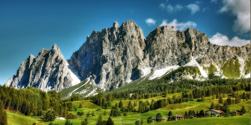 fields, sky, tranquility, non-urban scene, mountain Range, outlook, land, green, landscape, environment, rocky mountain, dolomites, meadow, beauty In Nature