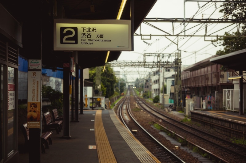 table, brown, railroad track, wooden, white, rail transportation, no people, Japan, text, railroad station, sky, communication, track, day, mode of transportation