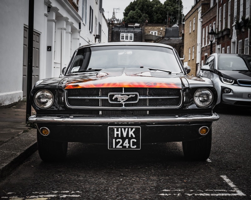 shiny, vintage, built structure, photography, stationary, transportation system, vintage car, luxury, building, text, car, vehicle, buildings, building exterior