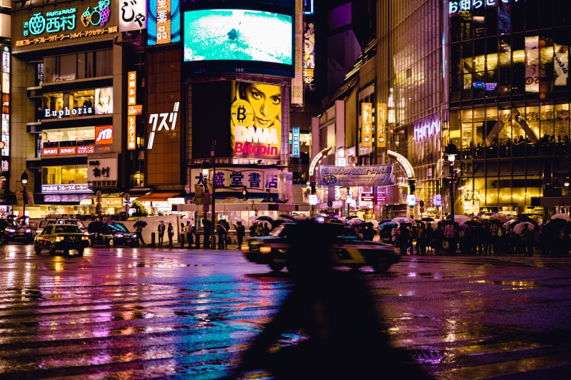 raining, city life, tokyo, night, nightlife, weather, buildings, crowd, night time, shibuya, puddles, beside, city, road, rain, architecture, building exterior