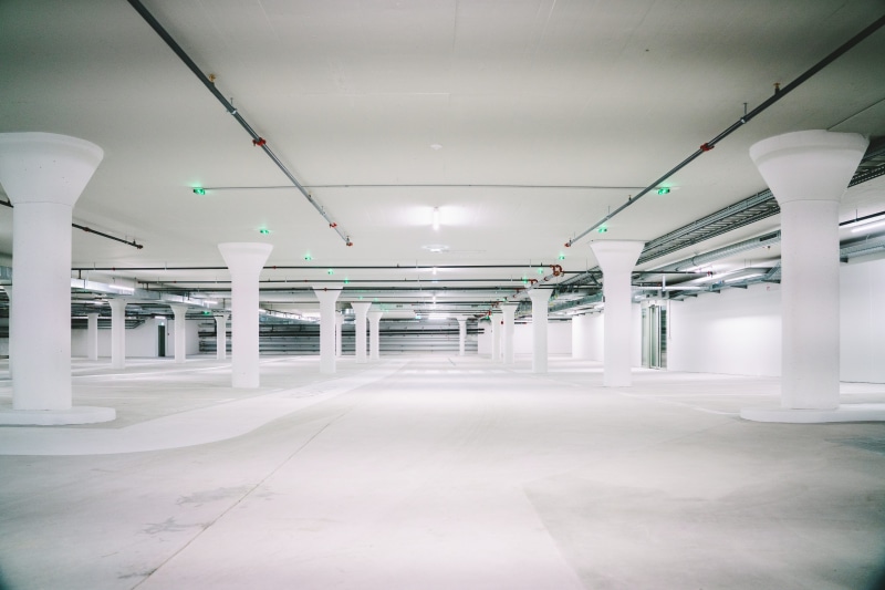lot, room, lighting equipment, car, corridor, illuminated, flooring, no people, white color, parking lot, white, absence, long, transportation, built structure