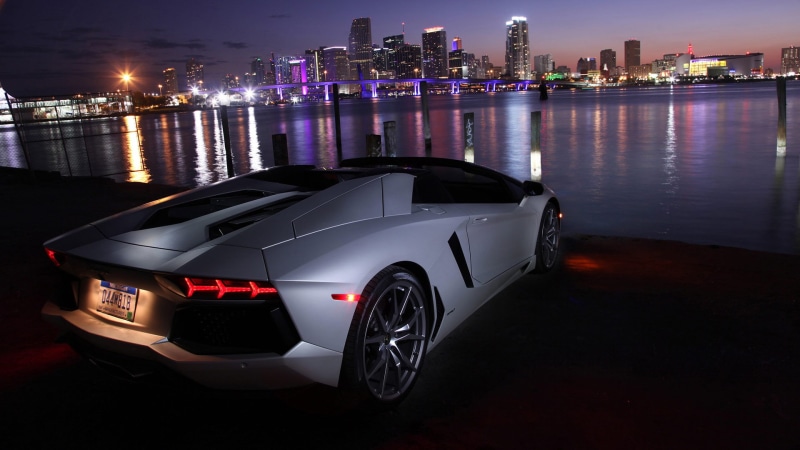 no people, design, motor vehicle, travel, mode of transportation, sport, drive, land vehicle, cityscape, speed, water, transport, vehicle, built structure