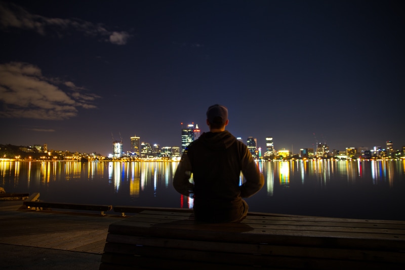 ocean, people, night, body, skyline, skyscraper, time, bench, tower, 5K, structure, illuminated, lifestyles, adult, jacket, reflection, city life, water
