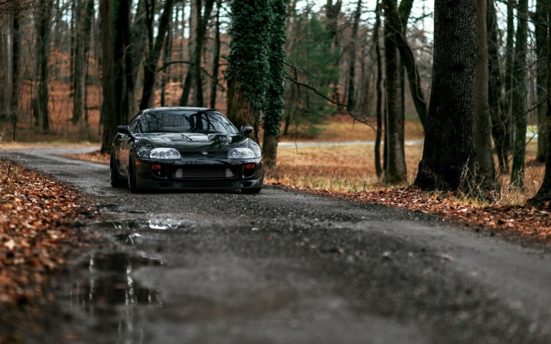 JDM, black, mode of transportation, tree trunk, road, nature, 1080P, tree, dirt road, car, outdoors, motor vehicle, surface level, selective focus, tuning