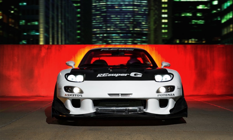tuning, no people, illuminated, city, night, technology, mode of transportation, red, motor vehicle, rx-7, car, single object, land vehicle, photography themes