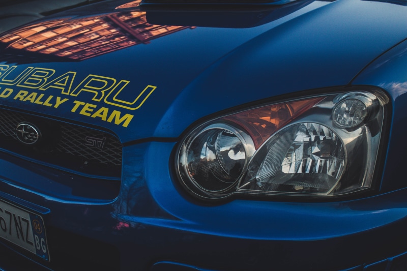 vehicle, no people, reflection, subaru, alloy wheel, sport car, tire, close-up, lighting equipment, blue, luxury, mode of transportation, metal, machine
