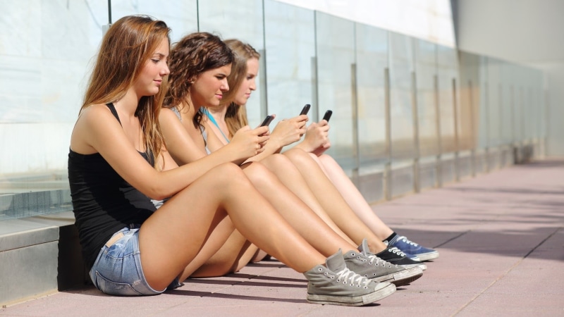 women outdoors, rooftops, talking, teenager, friendship, Converse, sunlight, city, outdoors, top, females, teenage Girls, fashion, city Life, connection