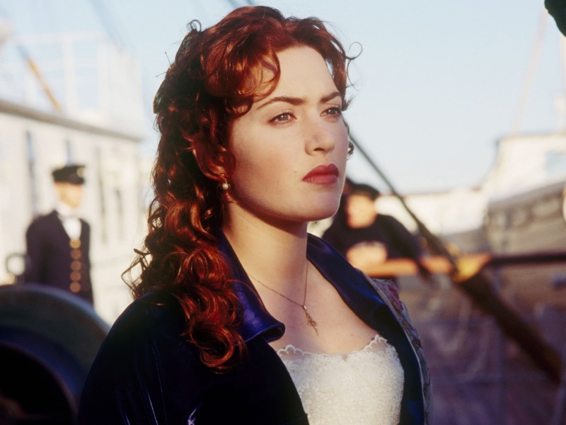 necklace, outdoors, contemplation, hairstyle, redhead, hair, focus on foreground, beauty, beautiful woman, Titanic, 720P, real people, headshot, portrait