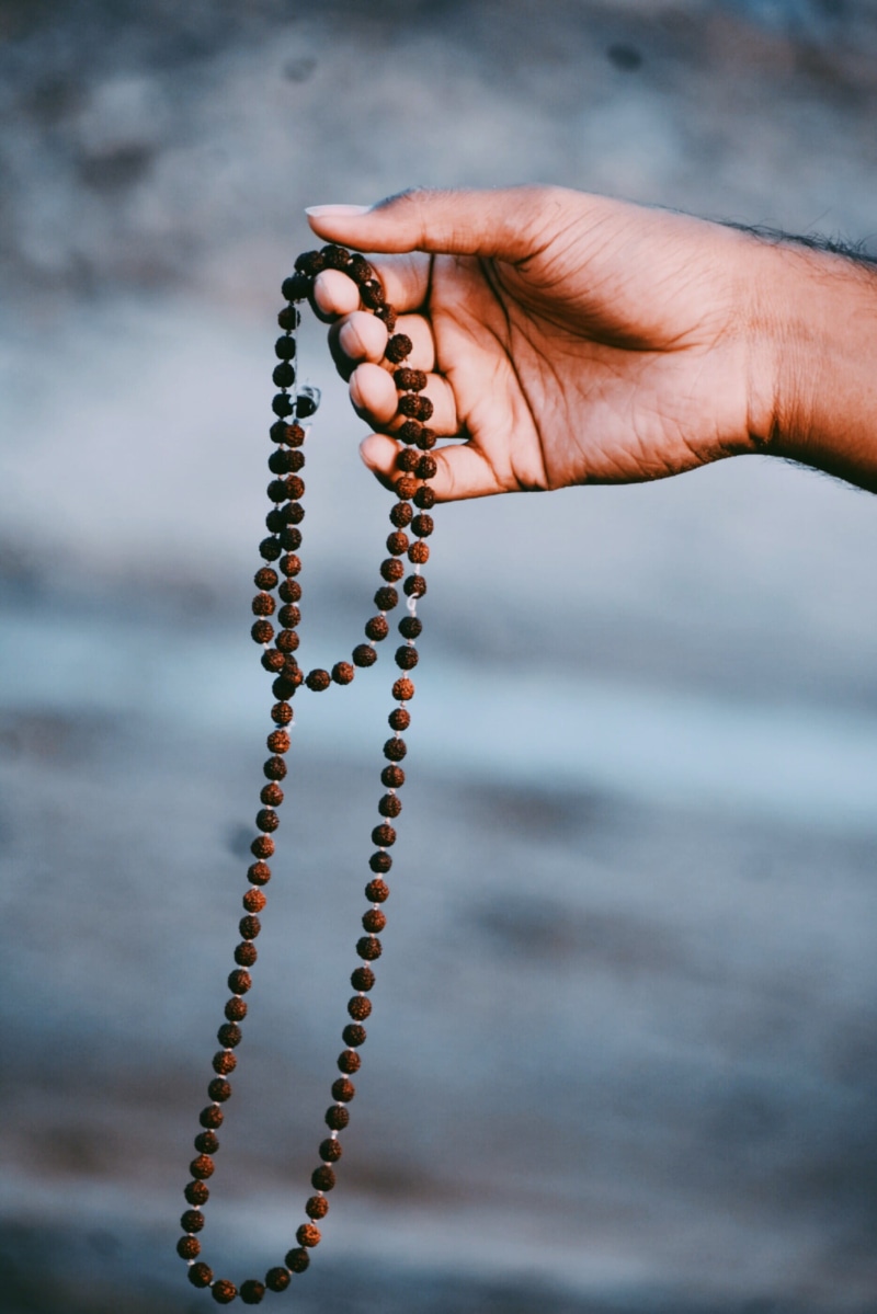 metal, one person, held, 2K, close-up, necklace, spirituality, focus on foreground, bead, human hand, holding, hand, day, real people, beads, chain, Mahadev
