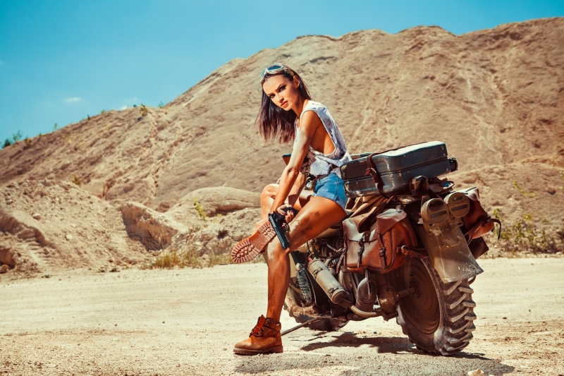 model, real people, rock formation, girls with guns, s, day, motorcycle, top, women, shorts, land, outdoors, straight hair, 1080P, sideboob, travel, adult
