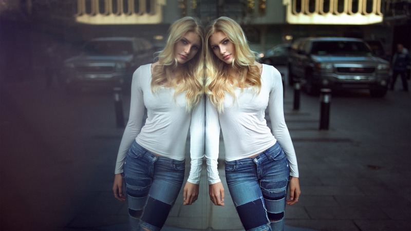 photography, city, mirror, shirt, white, two people, hair, front view, looking at viewer, casual clothing, 1080P, fashion, standing, blond hair, adult