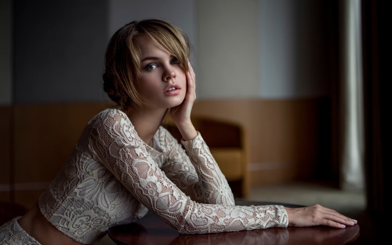 looking at viewer, focus on foreground, young women, women, young adult, portrait, short hair, sleeved, adult, contemplation, s, one person, clothing, white