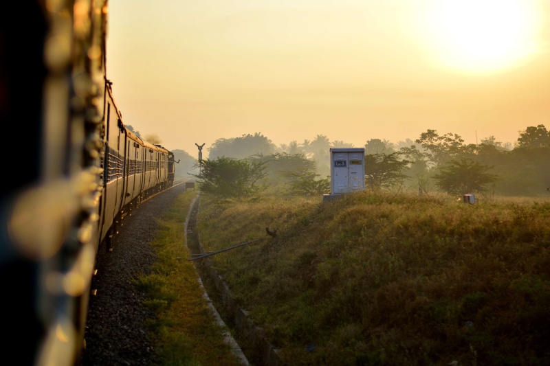 field, mode of transportation, building exterior, grass, transportation, track, sky, plant, sunset, background, nature, train - vehicle, pollachi, train