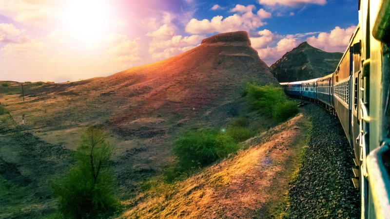 hills, tranquility, railway, sunlight, beauty in nature, cloud - sky, travel destinations, sunny, tranquil scene, journey, outdoor, railroad, bridge - man made structure