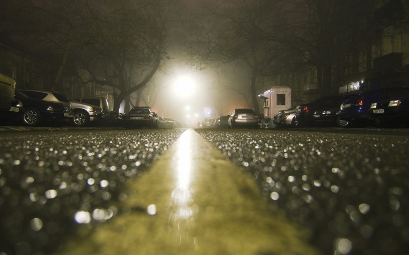 shiny, car, trees, mode of transportation, concrete, transportation, land vehicle, rain, architecture, building exterior, motor vehicle, in a row, surface level