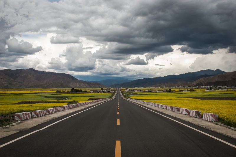 china, outdoors, gray, clouds, sky, beauty in nature, cloud - Sky, sign, summer, nature, landscape, tibet, highway, yellow, mountain range, tranquil scene