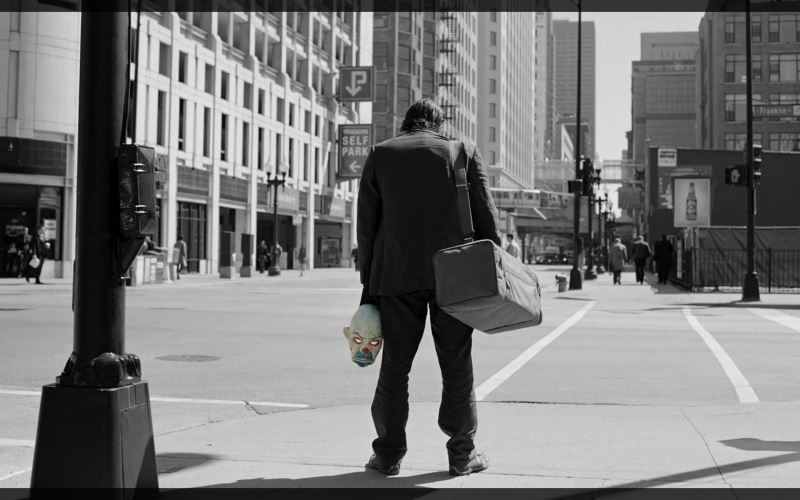bag, street, sidewalk, pants, city life, adult, incidental people, Joker, The Dark Knight, building exterior, real people, day, women, transportation, architecture