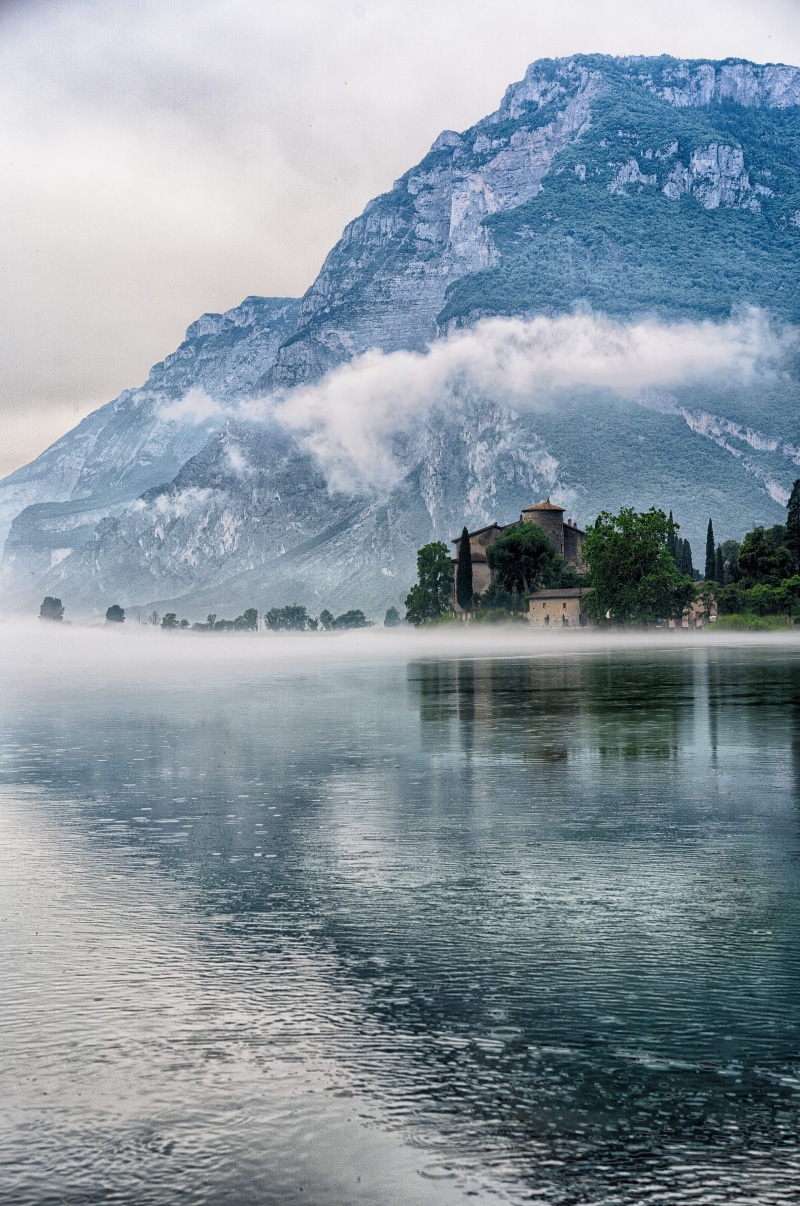 sky, misty, switzerland, trento, beauty In Nature, travel, hill, sea, outdoors, church, mountain Range, nature, castle, toblino, mist, tourism, no People