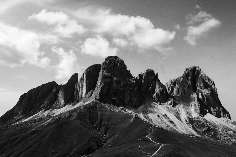 peak, mountain, snowcapped mountain, mountain peak, dolomites, campitello di fassa, sky, rock formation, outdoors, rocky mountains, no people, sunny, tranquil scene