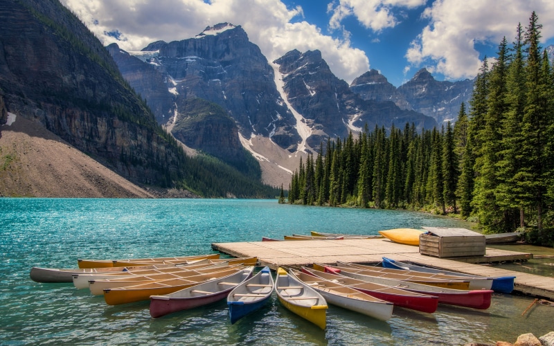 sky, tranquility, moored, nautical vessel, mode of transportation, tranquil scene, mountain range, banff, landscape, nature, water, transportation
