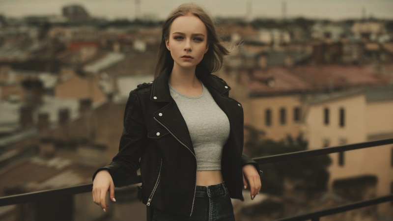 building exterior, looking at camera, black jackets, outdoors, front view, lifestyles, beauty, 1080P, women, young women, real people, built structure