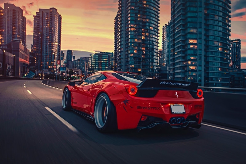 city life, sunset, Ferrari 458 Italia, traveling, land vehicle, skyscraper, built structure, no people, car, sports, sky, modern, architecture, tuning