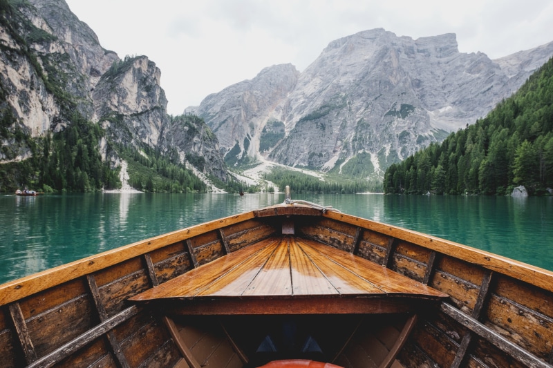 water, day, tranquility, scenics, tranquil Scene, riding, lake, summer, outdoors, daytime, mountain, moving, tree, transportation, nautical vessel, beauty In Nature
