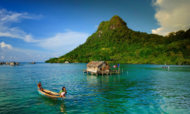 island, blue, Indonesia, mountain, palm trees, incidental people, tranquility, boat, nautical vessel, non-urban scene, scenics - nature, clouds, waterfront
