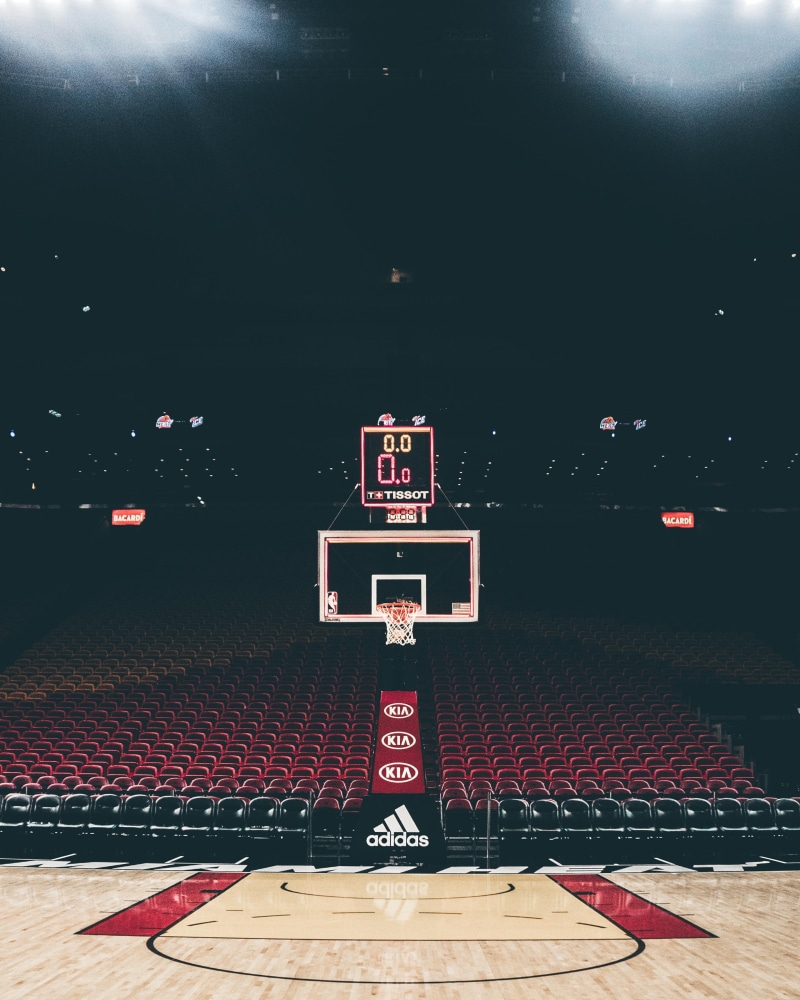 text, dark, miami heat, sign, adidas, indoor, sport, shot clock, nba, communication, aerial, basketball, stage, kia, red, photography, athletics, stage - performance space