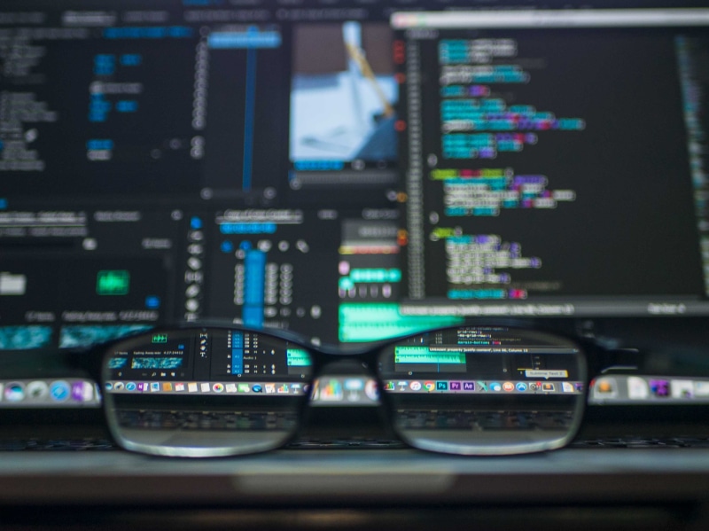 business, indoors, mode of transportation, adobe, vehicle interior, electronics, lights, focus, communication, connection, hacker, photo, glasses, website