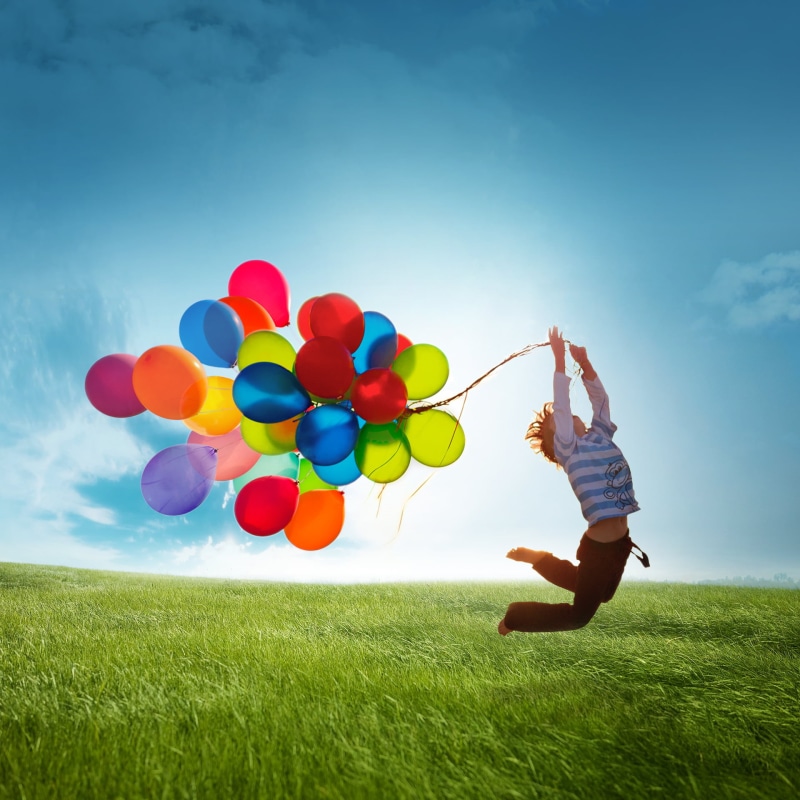 balloon, carefree, lifestyles, blue, girls, assorted, meadow, full length, color, action, women, celebration, nature, smiling, outdoors, jumping, day, relaxation