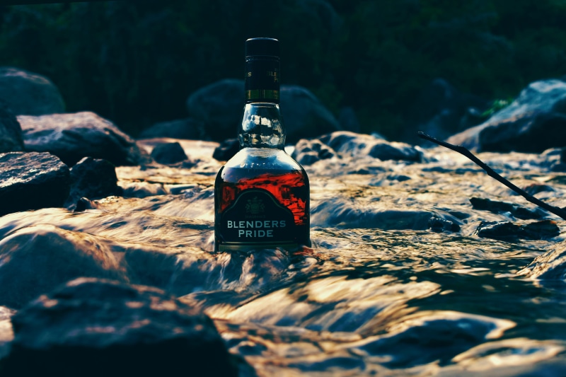 river, whisky, ice, fire hydrant, liquor, selective focus, blenders, focus on foreground, alcohol, plant, water, 4K, sunlight, beverage, western script