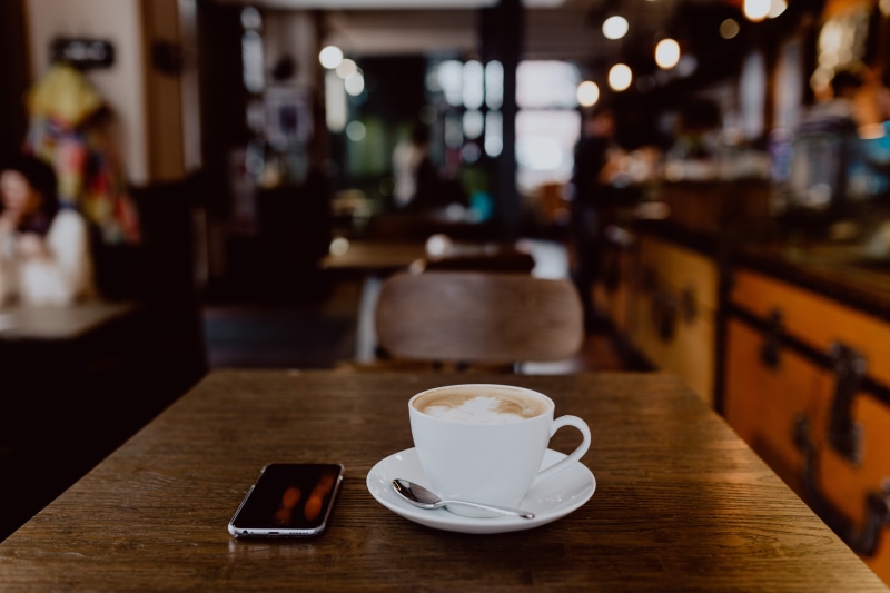 crockery, saucer, drink, work, coffee - drink, smart phone, mug, focus on foreground, refreshment, coffee break, mobile phone, technology, bar counter