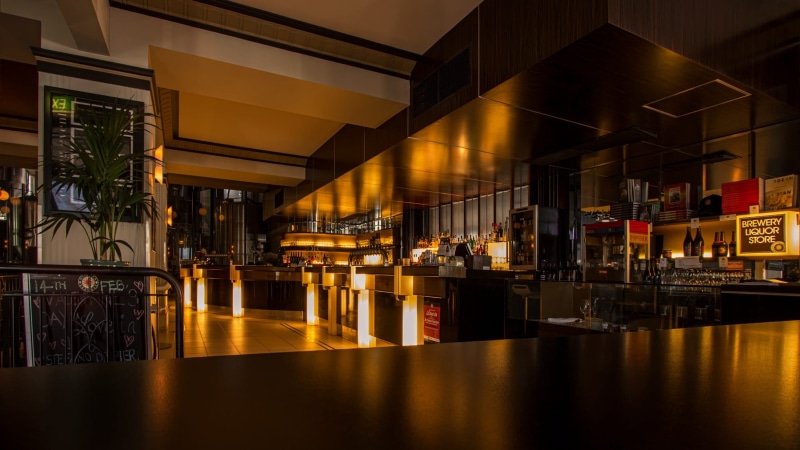 bar - drink establishment, refreshment, bottle, glass, pub, night, city, luxury, interior, reflection, architecture, table, bar, container, liquor, indoor plants