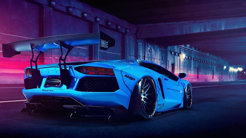motor vehicle, blue, architecture, communication, indoors, supercar, transportation, sign, vintage car, land vehicle, illuminated, lamborghini aventador