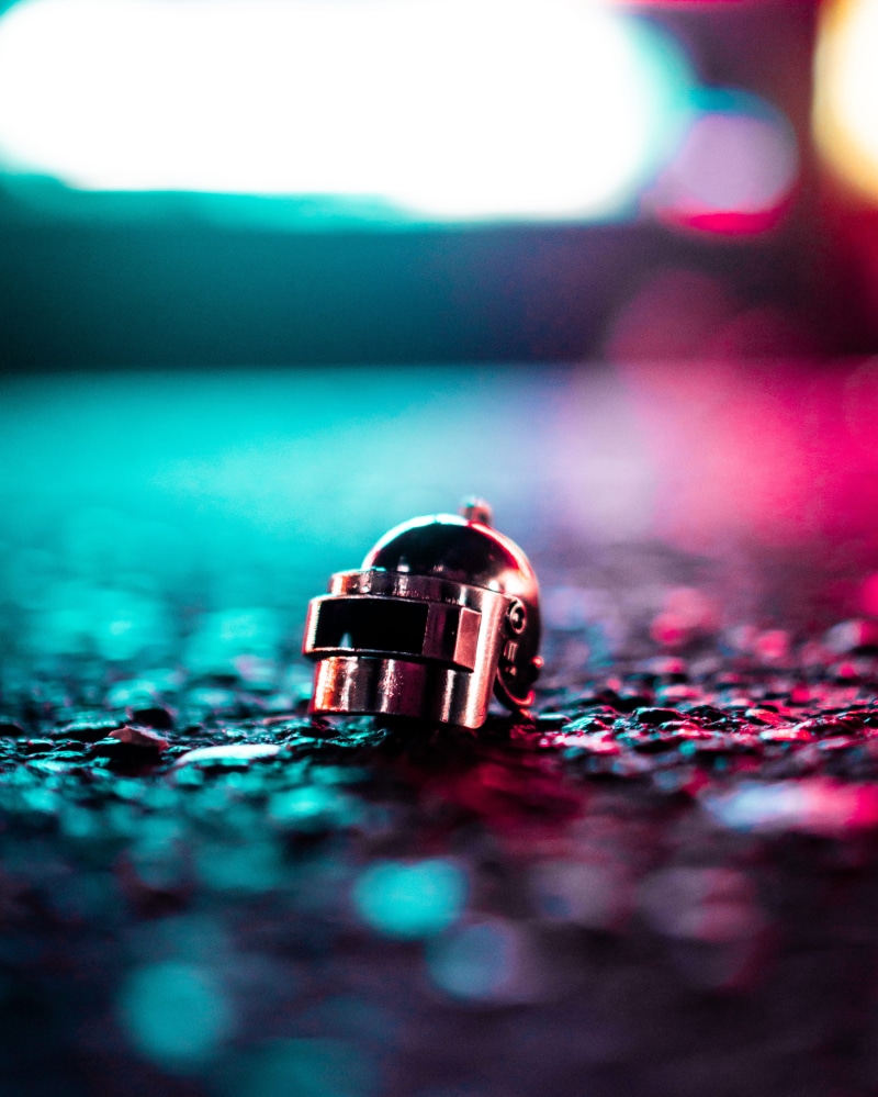 table, close-up, electrical equipment, toy, wheel, glitter, technology, clothing, road, safety, machine, pubg, personal accessory, selective focus, pubg helmet