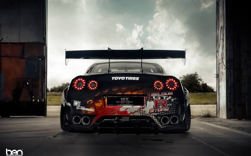 transportation, built structure, western script, car, street, no people, text, GT-R, architecture, black, road, garage, nature, Liberty Walk, travel, day