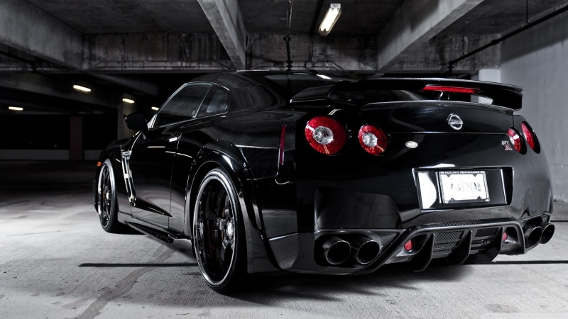parking garage, outdoors, sports car, luxury, no people, mode of transportation, 2K, stationary, land vehicle, architecture, city, black, gt, tire, motor vehicle