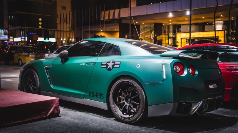 land vehicle, no people, city, outdoors, r, built structure, coupe, building exterior, green, retro styled, army, vintage car, travel, Nissan, nightlife