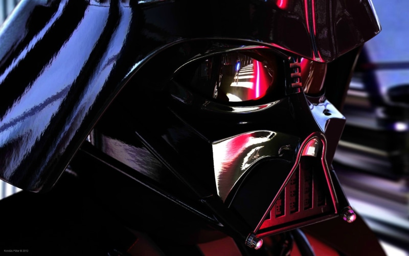 motor vehicle, still life, machinery, no people, wheel, vader, car, sunlight, metal, darth, close-up, focus on foreground, indoors, technology, Star Wars