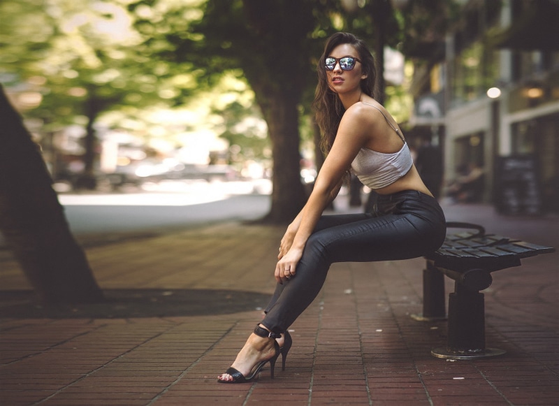 hair, 720P, high heels, real people, beautiful woman, young adult, sunglasses, hairstyle, legs, focus on foreground, portrait, city, street, young women