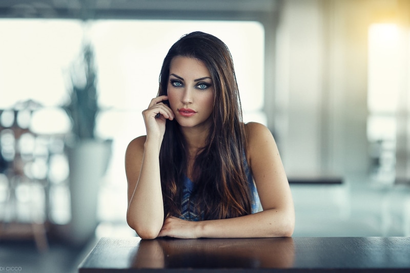 contemplation, young adult, women, smoky eyes, long hair, looking at camera, blue, casual clothing, brown hair, front view, moles, top, sleeveless, adult