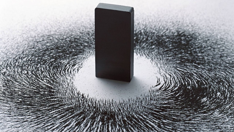 black color, indoors, wireless technology, reflection, high angle view, studio shot, geometric shape, smart phone, technology, close-up, no people, single object