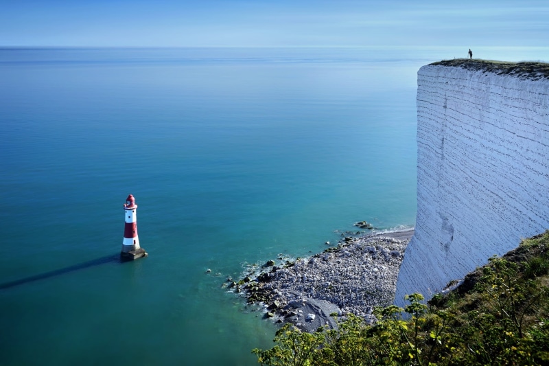horizon over water, UK, horizon, nature, guidance, scenics - nature, lighthouse, men, built structure, solid, day, building exterior, white, red, architecture