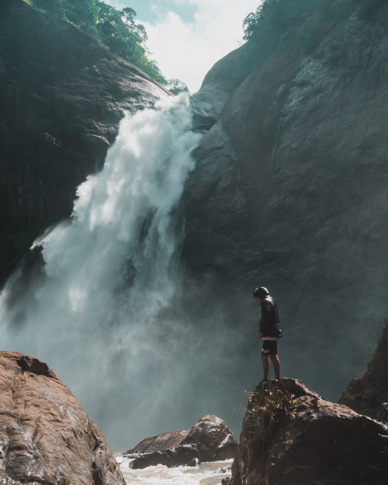 beauty, waterfall, hike, person, full length, brown, standing, mountain, recreation, rock, bali, tropical, flowing water, action, leisure activity, male