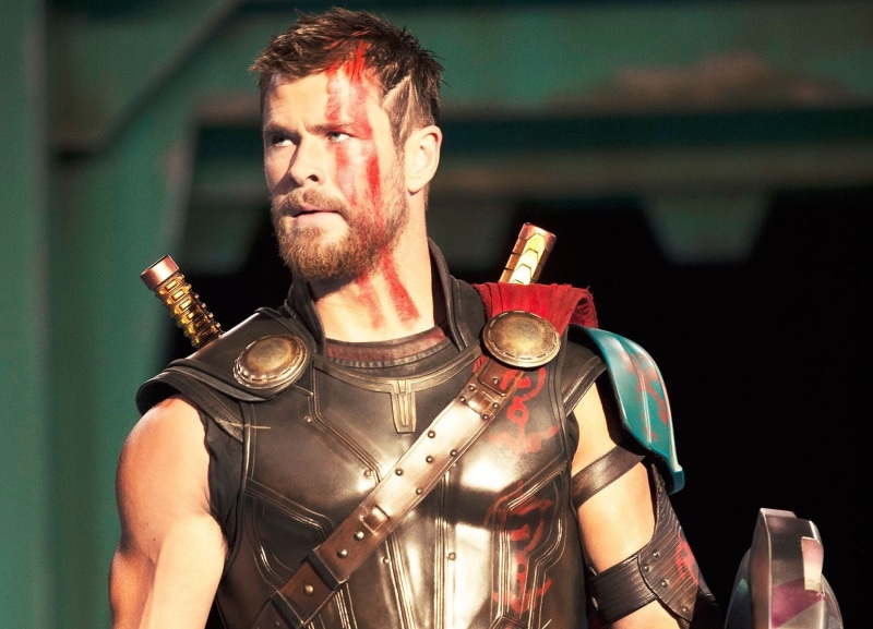 indoors, holding, Thor: Ragnarok, aggression, tattoo, lifestyles, adult, architecture, Movie, sword, conflict, sport, Chris Hemsworth, arts culture and entertainment