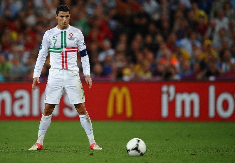 Euro 2012, team Sport, sports Uniform, ball, event, match - sport, success, form, red, sports equipment, young adult, focus on foreground, portrait, soccer
